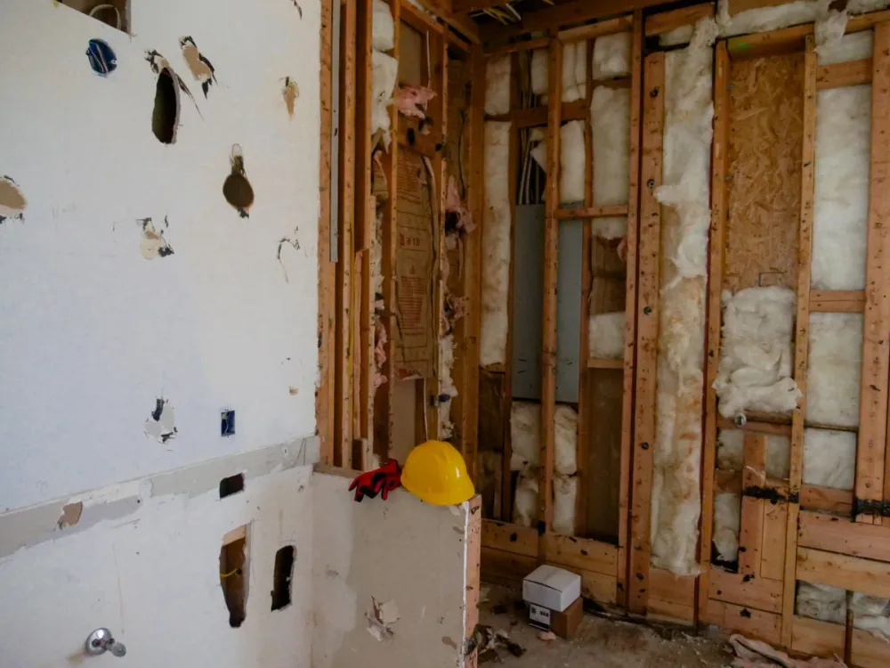 Interior room stripped to the studs for demolition